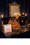 Small brown leather bucket handbag