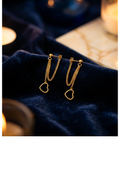 Gold tone heart drop earrings