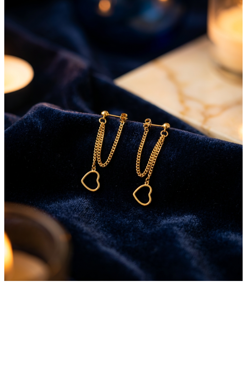 Gold tone heart drop earrings