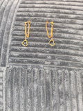 Gold tone heart drop earrings